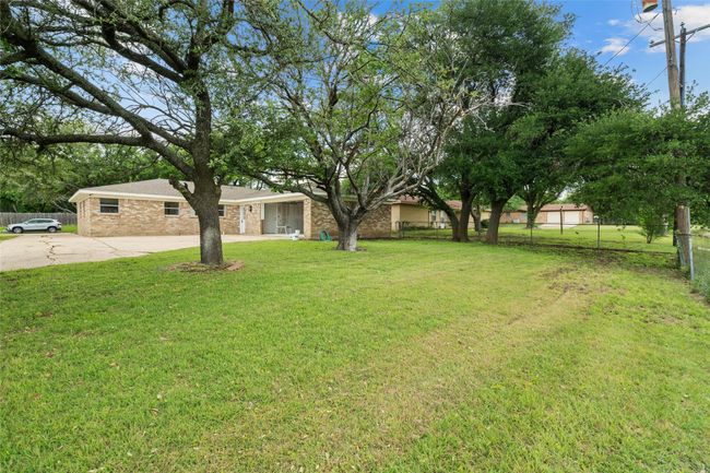 View of yard featuring concrete driveway | Image 31