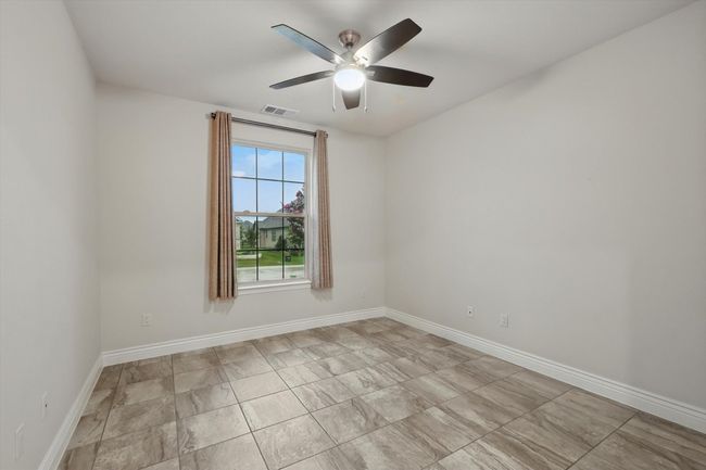 Den - Office showing tile floor and ceiling fan | Image 22