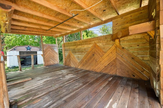 Wooden deck featuring a shed | Image 18