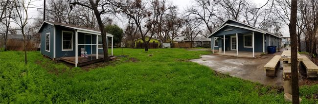 View of yard with an outdoor structure and a patio area | Image 19