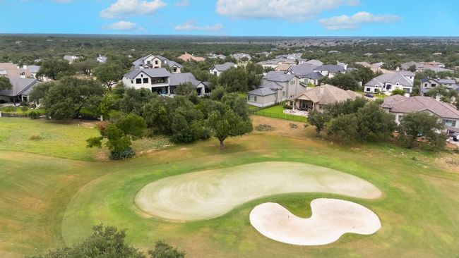 Aerial view of residential area with a golf course | Image 33