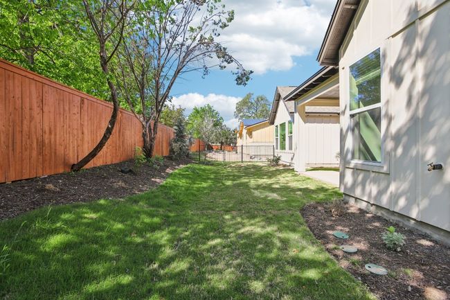 View of yard featuring a fenced backyard | Image 37