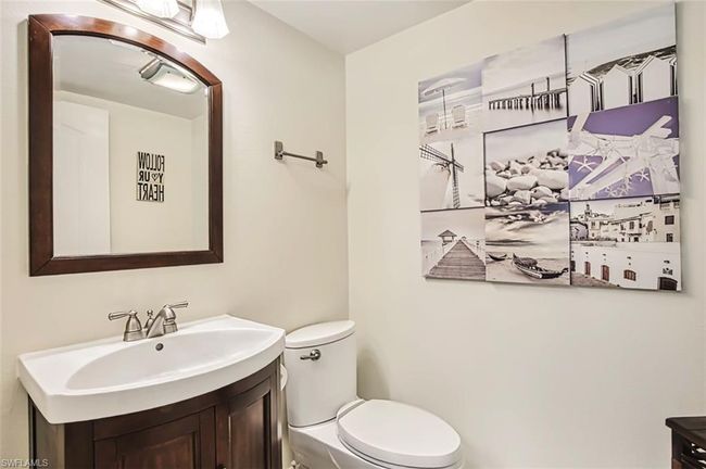 Bathroom with toilet and vanity | Image 25