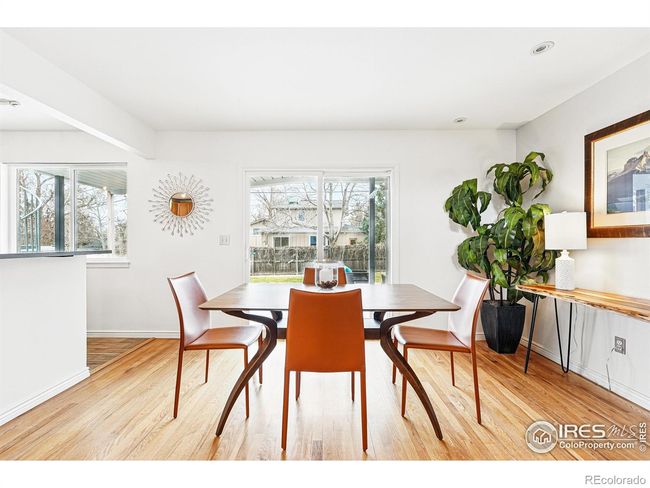 the huge glass slider connects with a generous south-facing patio | Image 10