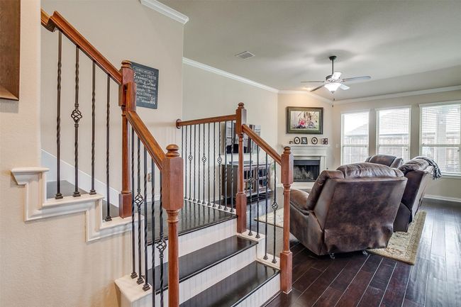 Staircase with wood floors. | Image 10