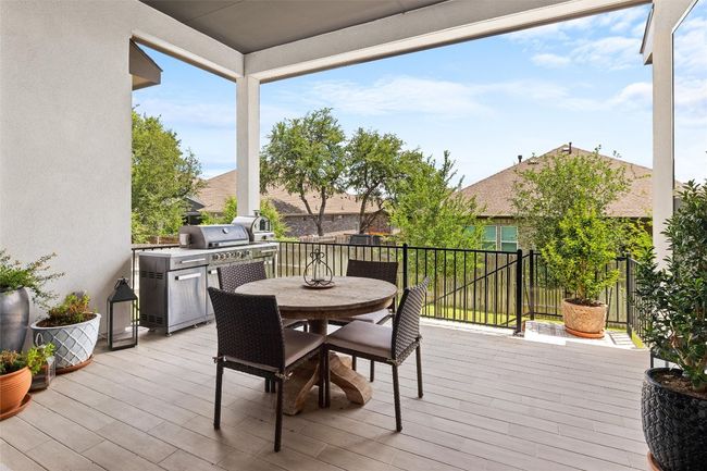Wooden terrace featuring outdoor dining space | Image 14