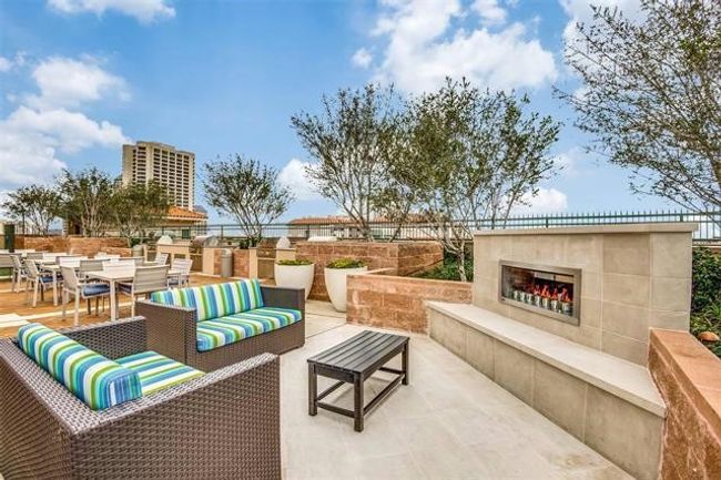 View of patio / terrace with outdoor dining area and an outdoor living space with a fireplace | Image 38