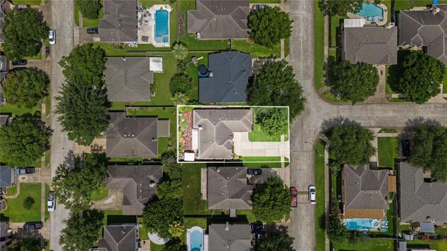 Bird’s-eye view highlights a well-maintained roof and durable shingles — offering long-lasting protection and peace of mind from the top down. | Image 4