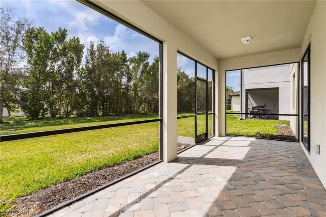 View of unfurnished sunroom | Image 30