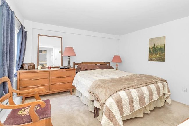 Bedroom with light carpet | Image 17