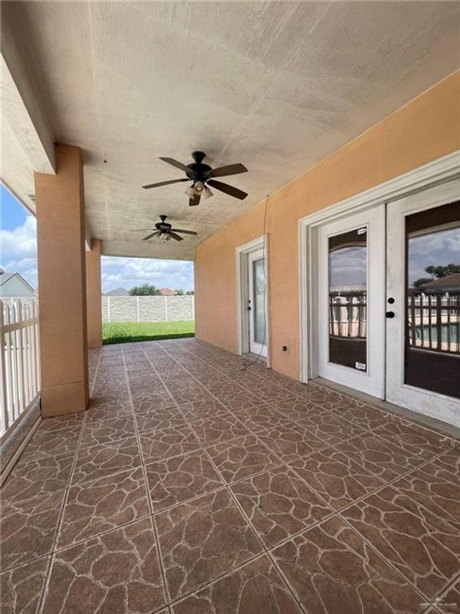 View of patio / terrace featuring french doors and a ceiling fan | Image 15