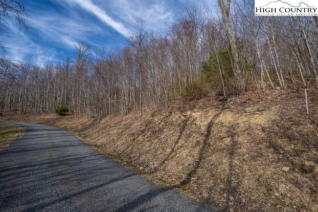 Driving back down street. Lot on right side | Image 13