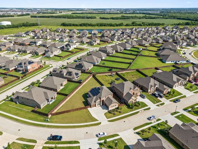 Aerial view of property and surrounding area with nearby suburban area | Image 30