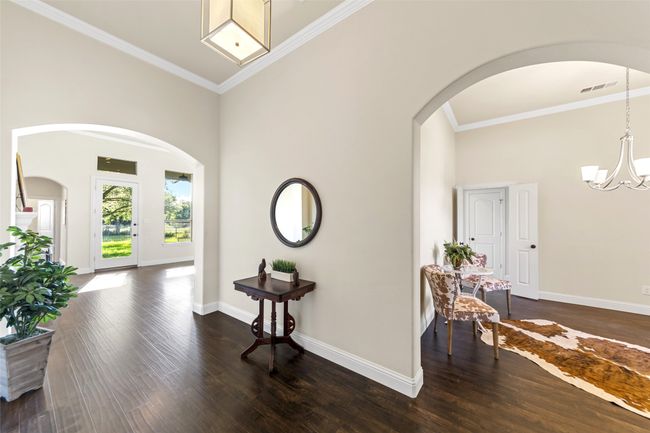 Lovely entry greets you with high ceilings and beautiful vinyl floorig! | Image 6