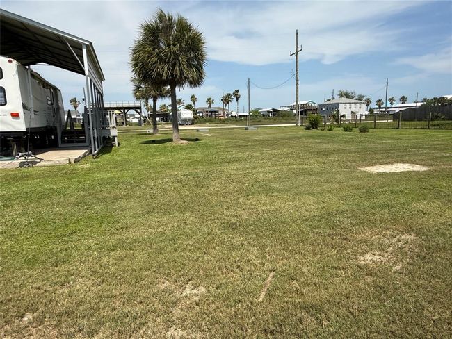 This is empty lot for an additional RV ports, or a new buyer may choose to sell the lot. | Image 28