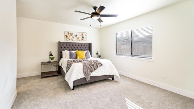 Empty room featuring carpet, baseboards, and a ceiling fan | Image 22