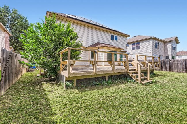 Rear view of property featuring a deck | Image 29