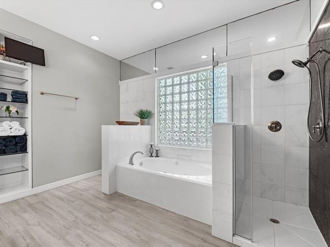 Main owners bathroom sept tub shower | Image 29