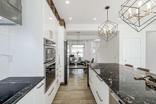 122 Rockywood Cir Nw, House other with 4 bedrooms, 4 bathrooms and 4 parking in Calgary AB | Image 14