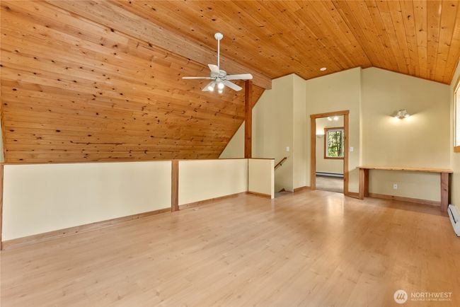 Abundant natural light , beautiful wood ceilings, built in office space. | Image 31