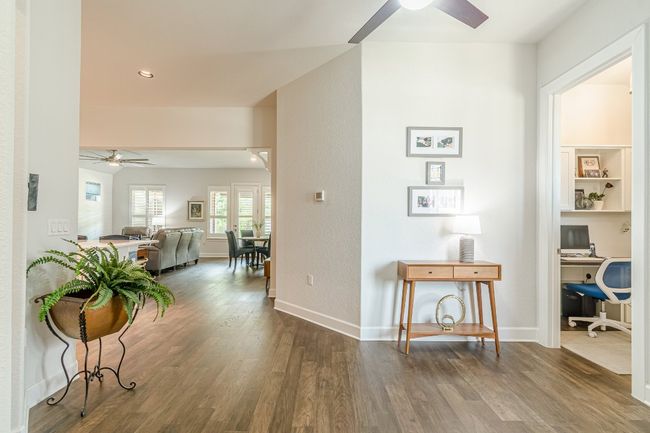 Corridor featuring an office area, wood finished floors, baseboards, and recessed lighting | Image 5
