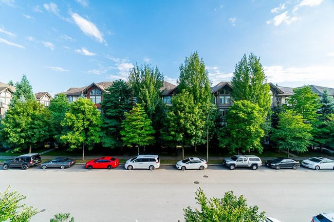 View of vehicle parking featuring a residential view | Image 24