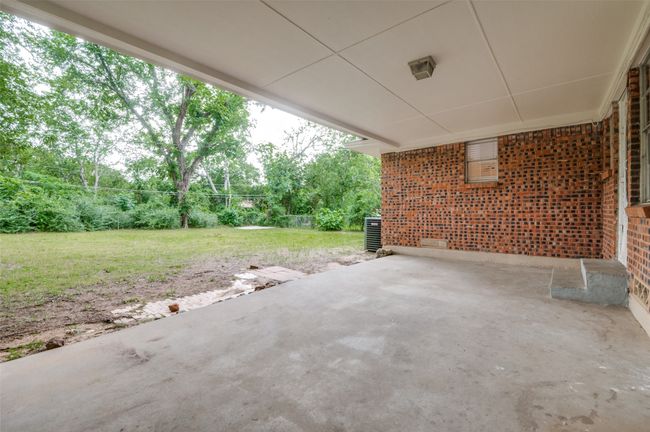 View of covered back patio | Image 24