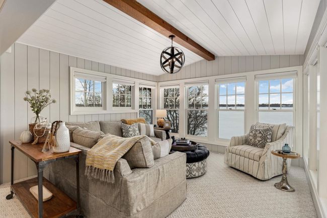The four season porch is the year round gathering space to enjoy the lake | Image 4