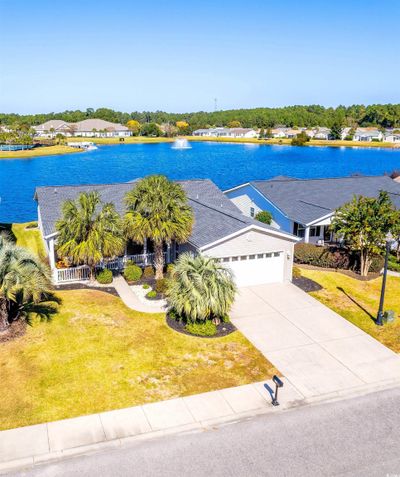 Birds eye view of property with a water view | Image 1