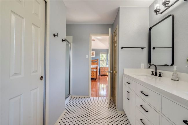 Primary bathroom has been newly renovated with cabinets, quartz counters, fixtures & hardware. | Image 21