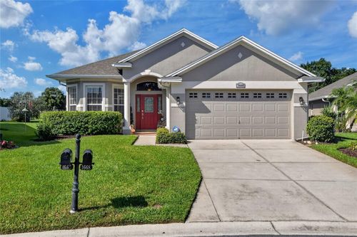1668 Rocky Pointe Dr, Lakeland, FL, 33813-1970 | Card Image