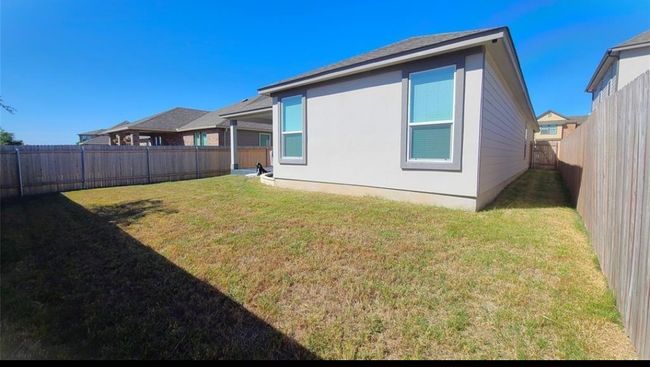 Back of house featuring a fenced backyard | Image 26