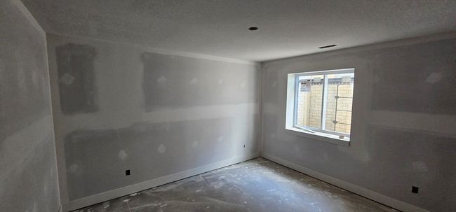 Empty room featuring baseboards | Image 14