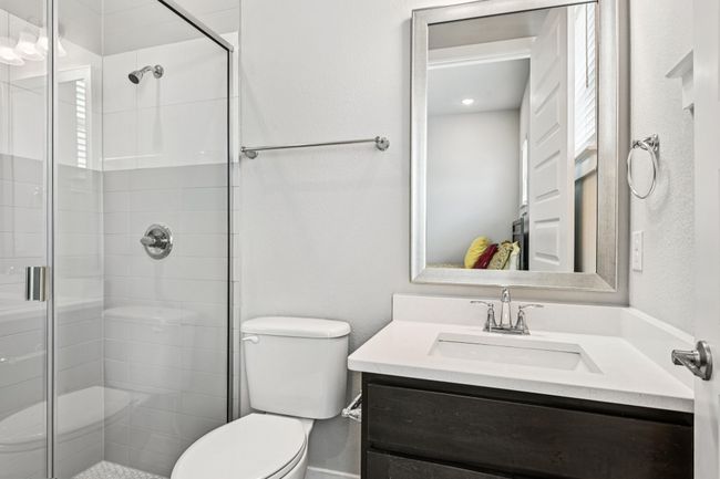 Full bathroom featuring vanity and a stall shower | Image 16