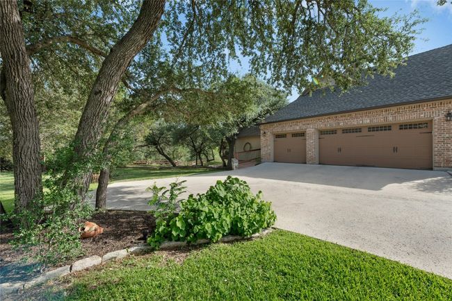 3-Car Garage & Parking Area | Image 36