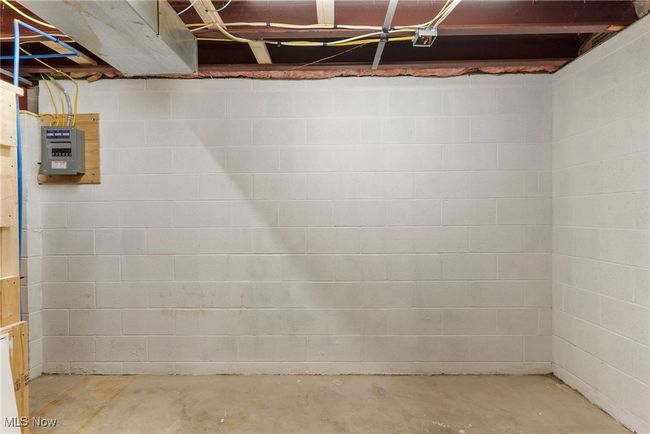 Unfinished basement with electric panel | Image 39