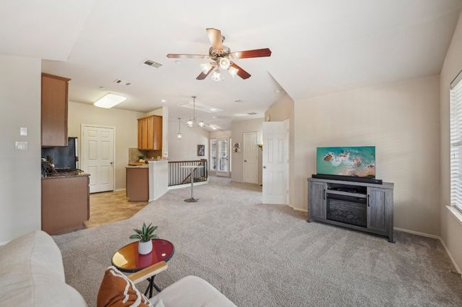 Light-Filled Living – Southeast-facing windows fill the main living space with sunshine. | Image 4