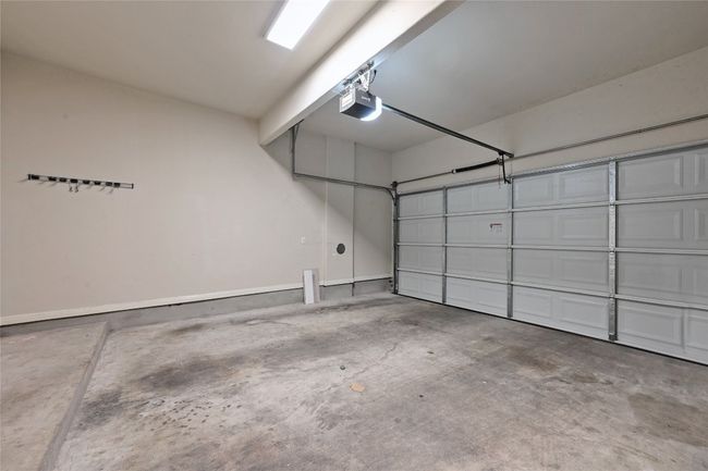 Two car garage attached to the unit with first floor entry | Image 23