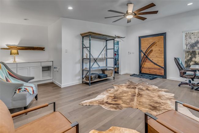 Guest quarters with a ceiling fan, light wood finished floors, and recessed lighting | Image 26