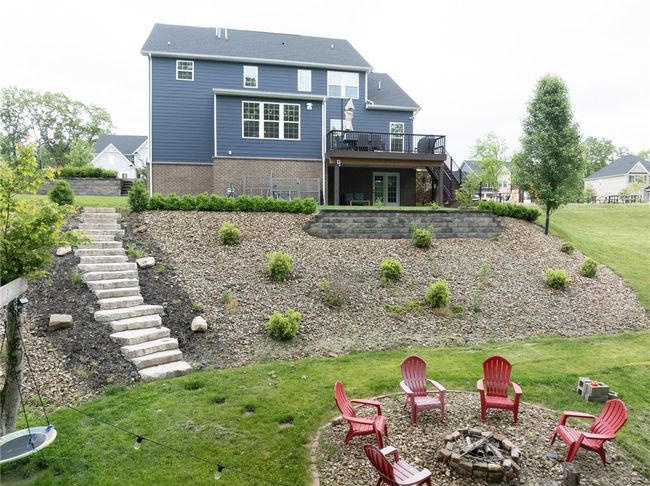 Steps Lead From The Upper Yard To The Firepit Area | Image 45