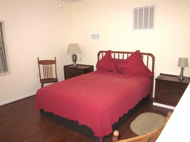 Furnished upstairs bedroom in Guest Suite B | Image 47