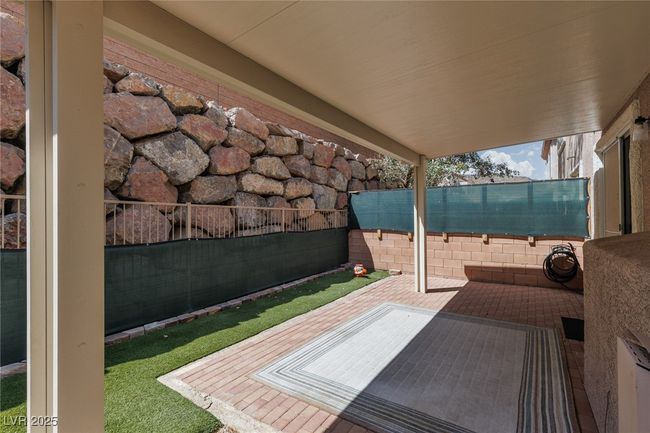 View of patio / terrace with a fenced backyard | Image 26