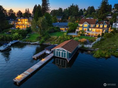 Nestled on the shores of Lake Washington this low bank waterfront offers easy access to the lake, a private boat house and an 89" dock. | Image 2