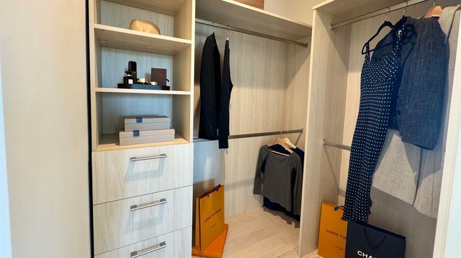 View of spacious closet | Image 7