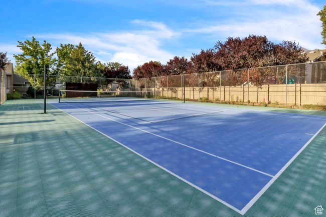 View of tennis court with community basketball court | Image 27