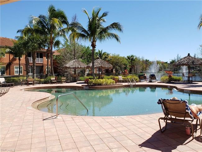 Community pool featuring a patio and fence | Image 36
