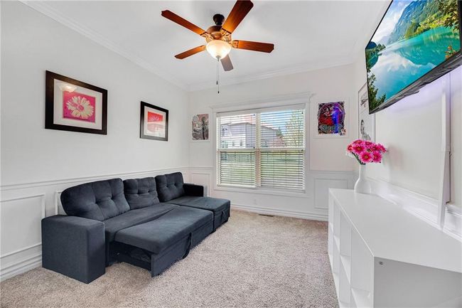 Bedroom on the main level used as a office space. | Image 35