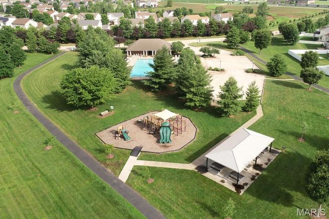 Aerial view of a pool area and a park | Image 44