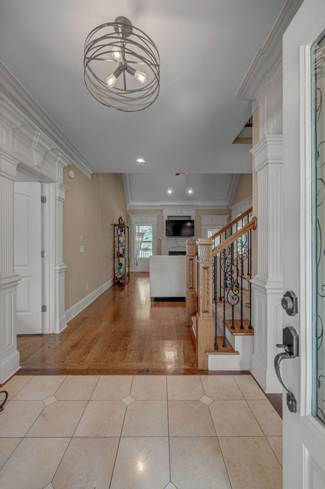 A view from the foyer into the family room. | Image 11