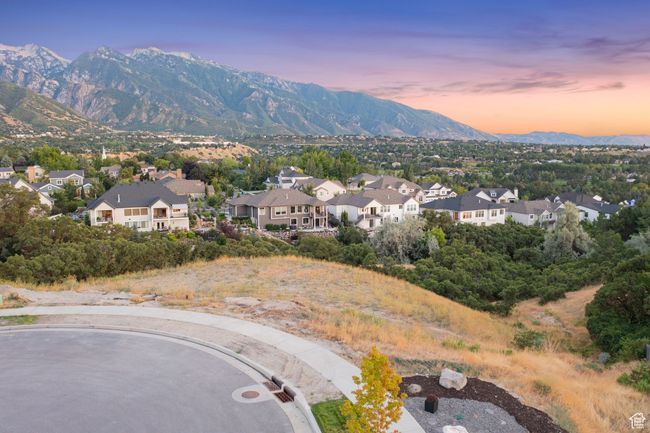View of mountain backdrop featuring nearby suburban area | Image 15